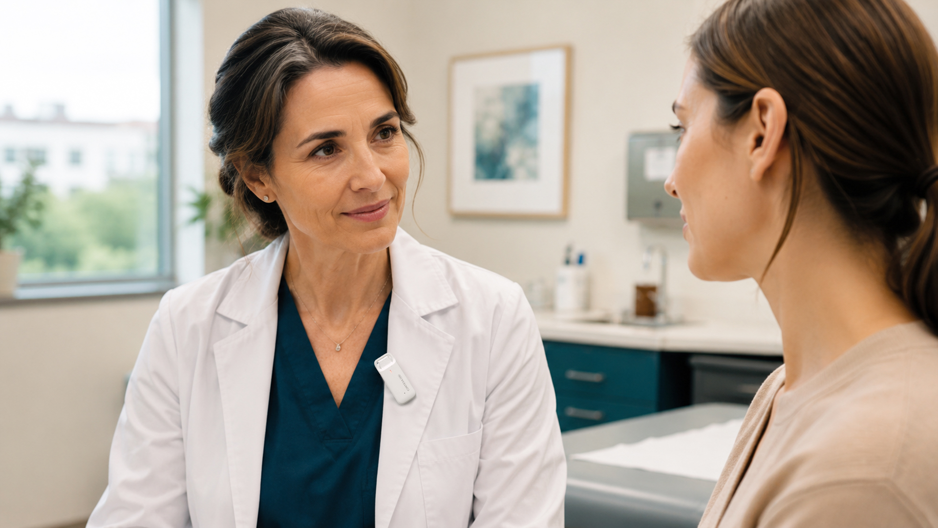Physician wearing the CortexaNote Recorder while speaking with a patient in an exam room